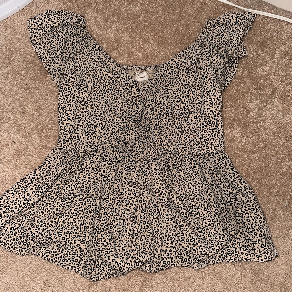 Black and White Ruffled Peplum Blouse with Cap Sleeves